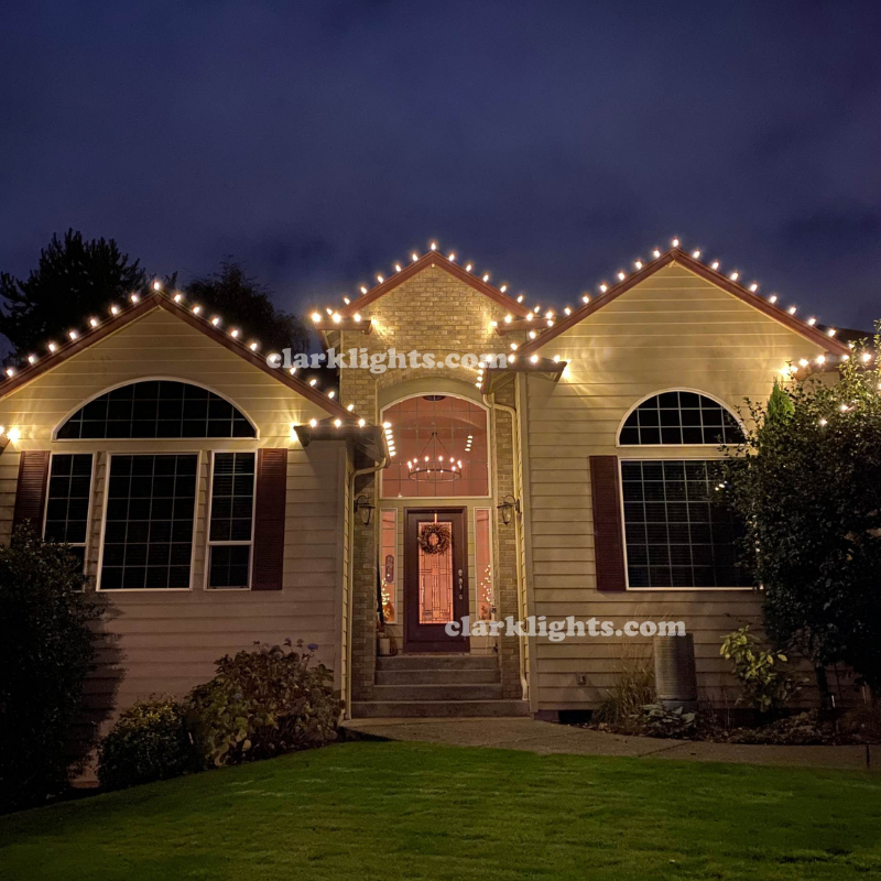 elegant holiday lighting on home roof line in clark county Washington clarklights.com 3603075664